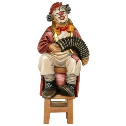 Clown con armonica