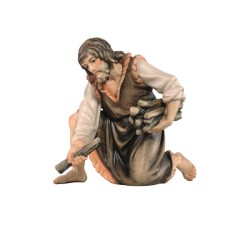 SI Herdsman kneeling withwood
