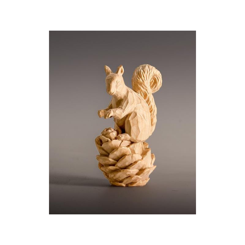 Squirrel in alpine pine wood